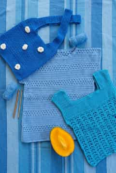 Sac bleu à fleurs vony porté par un enfant